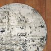 8' Ivory Teal Machine Woven Abstract Round Indoor Area Rug