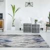10' X 13' Grey Navy Blue Machine Woven Tropical Leaves Area Rug