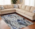 10' X 13' Grey Navy Blue Machine Woven Tropical Leaves Area Rug
