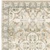 5' X 8' Beige And Ivory Medallion Area Rug